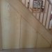 Built in cupboards under stairs